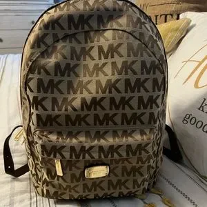 Bags | Michael Kors Tan Backpack | Poshmark display picture 1
